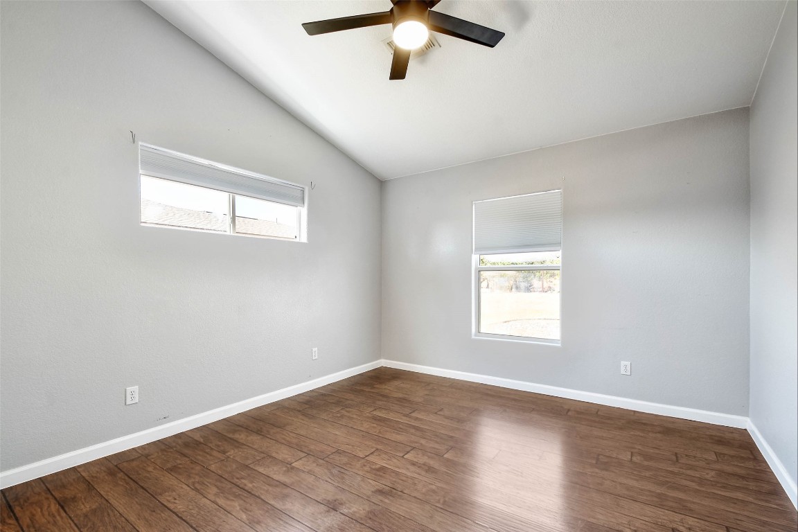 1265 Bob White Drive Spring Branch, TX 78070 - Photo 20 of 25 a view of empty room with wooden floor and fan