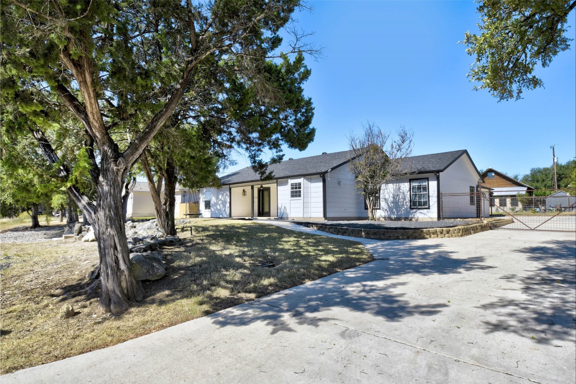 1265 Bob White Drive Spring Branch, TX 78070 - Photo 3 of 25 a view of a house with a yard covered in snow