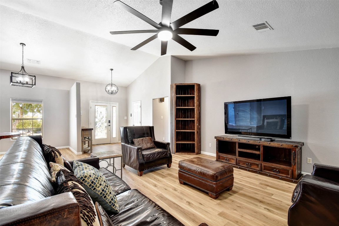1265 Bob White Drive Spring Branch, TX 78070 - Photo 10 of 25 a living room with furniture and a flat screen tv