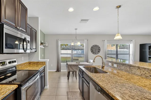 an aerial view of residential building with parking space