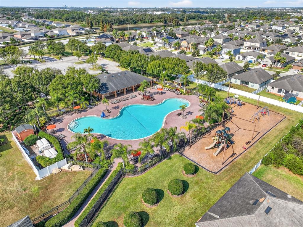 11214 Carrick Stone Street Wimauma, FL 33598 - Photo 7 of 73 an aerial view of residential houses with outdoor space
