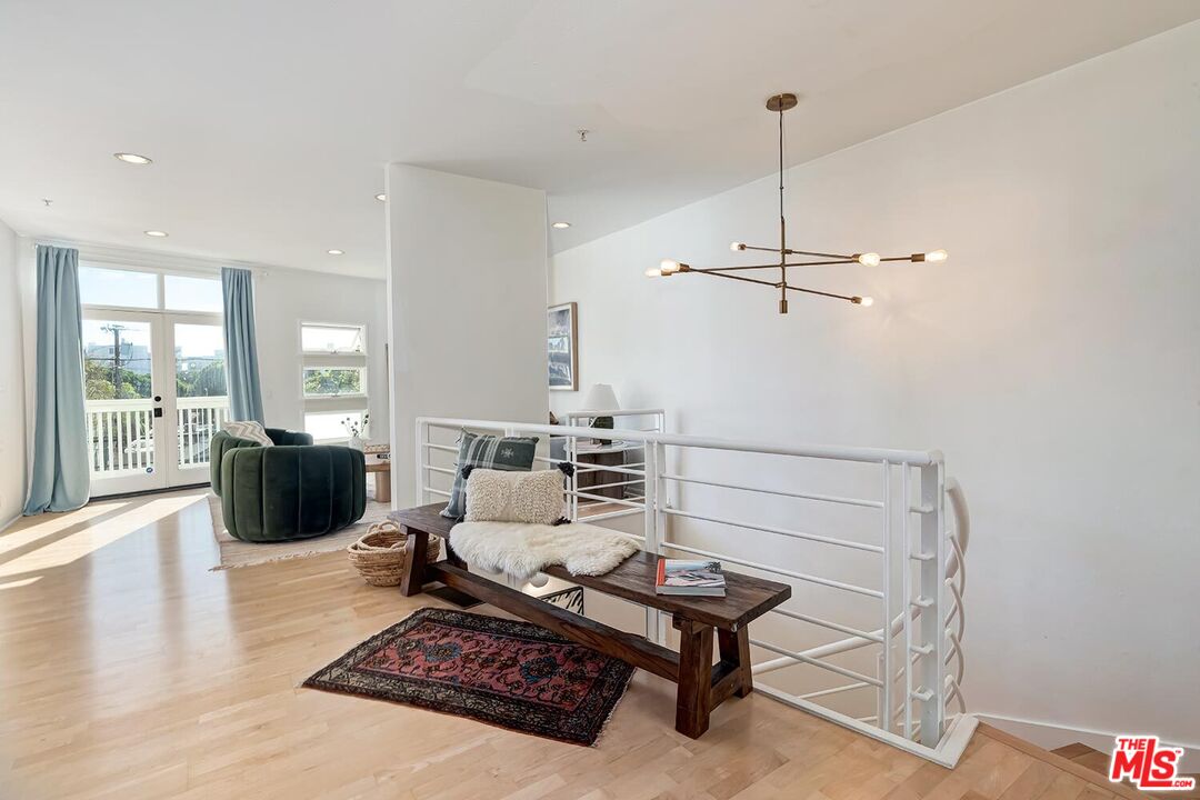 3002 3rd Street, Unit 203 Santa Monica, CA 90405 - Photo 14 of 44 a living room with furniture