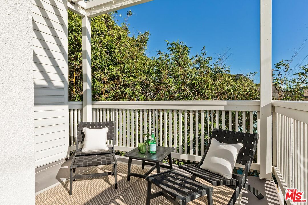 3002 3rd Street, Unit 203 Santa Monica, CA 90405 - Photo 15 of 44 a view of a balcony with chairs