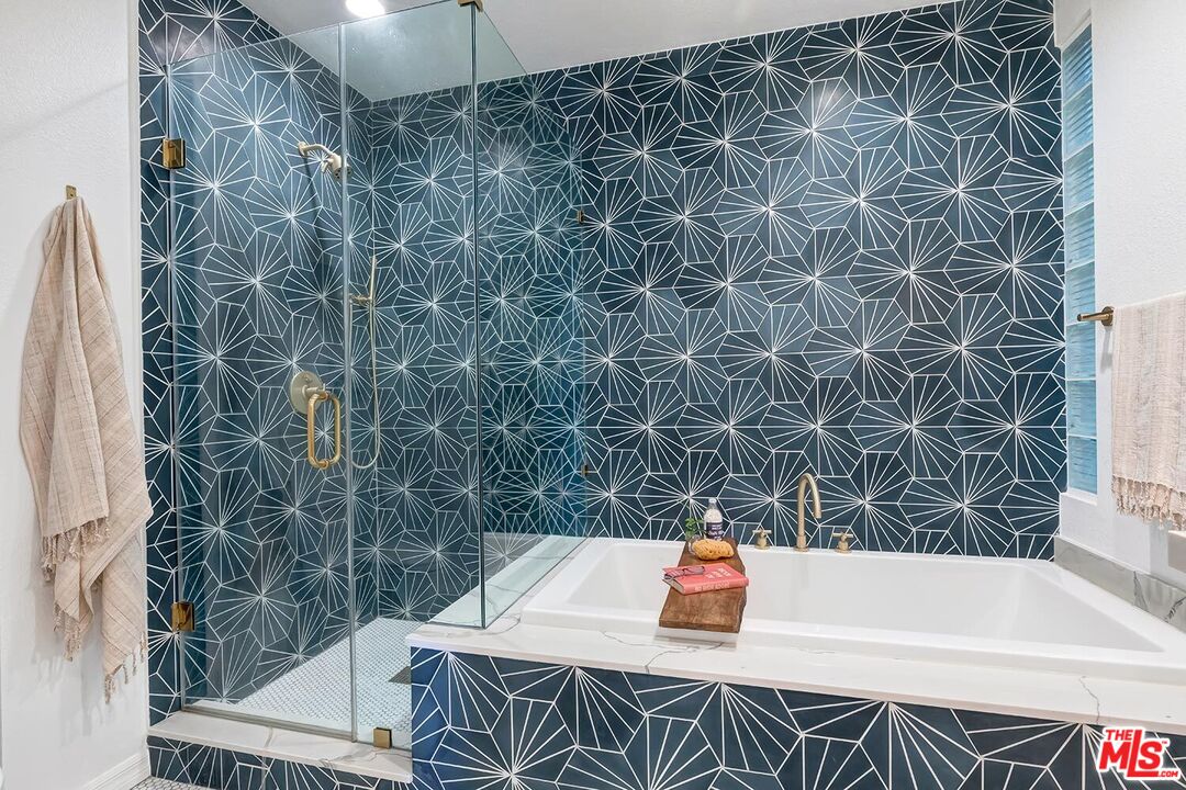 3002 3rd Street, Unit 203 Santa Monica, CA 90405 - Photo 36 of 44 a bath room with a toilet and a shower