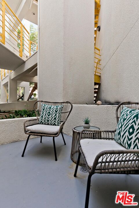 3002 3rd Street, Unit 203 Santa Monica, CA 90405 - Photo 39 of 44 a view of a chairs and table in a room