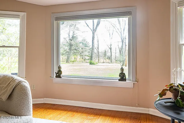 a view of a vase of flowers sitting on a table