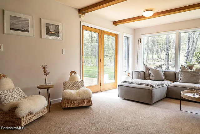a view of a vase of flowers sitting on a table
