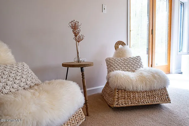 a bathroom with a toilet sink and vanity