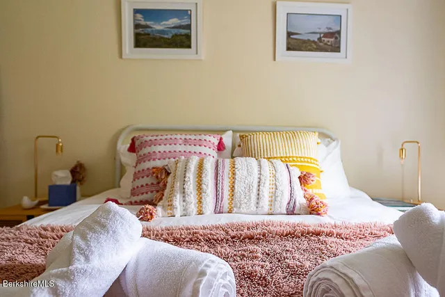 a view of a back yard of the house with a fountain back yard