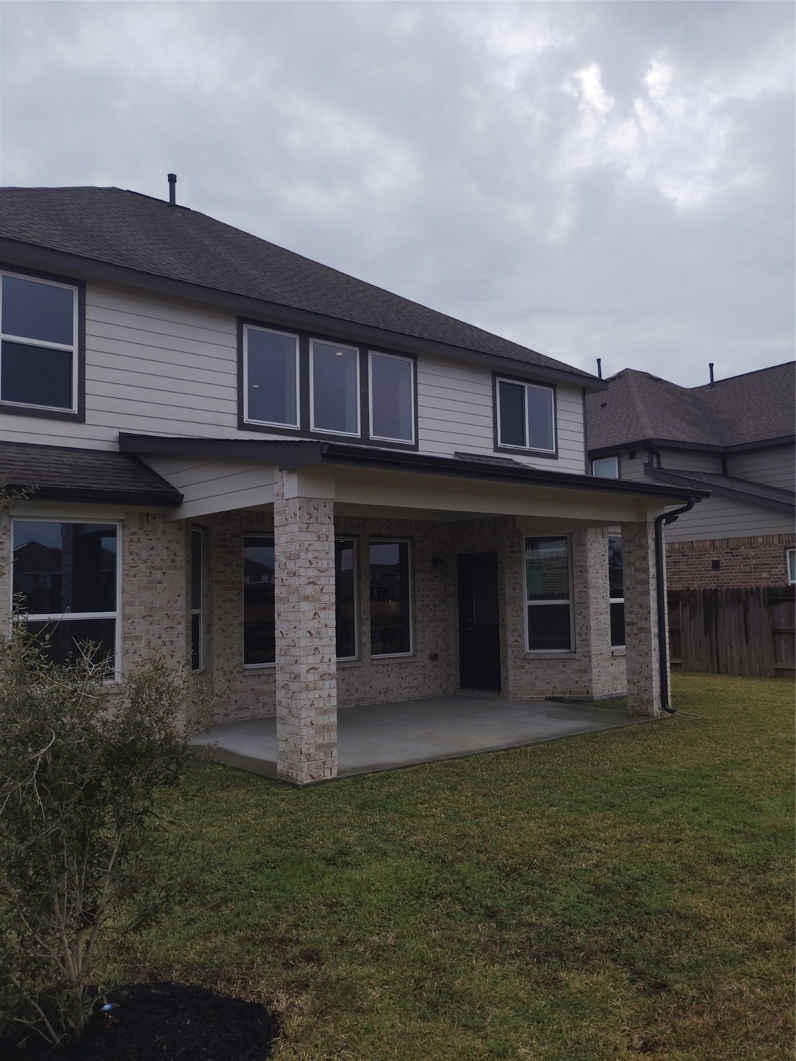 85 Carmel Drive Manvel, TX 77578 - Photo 5 of 31 a house view with a garden space