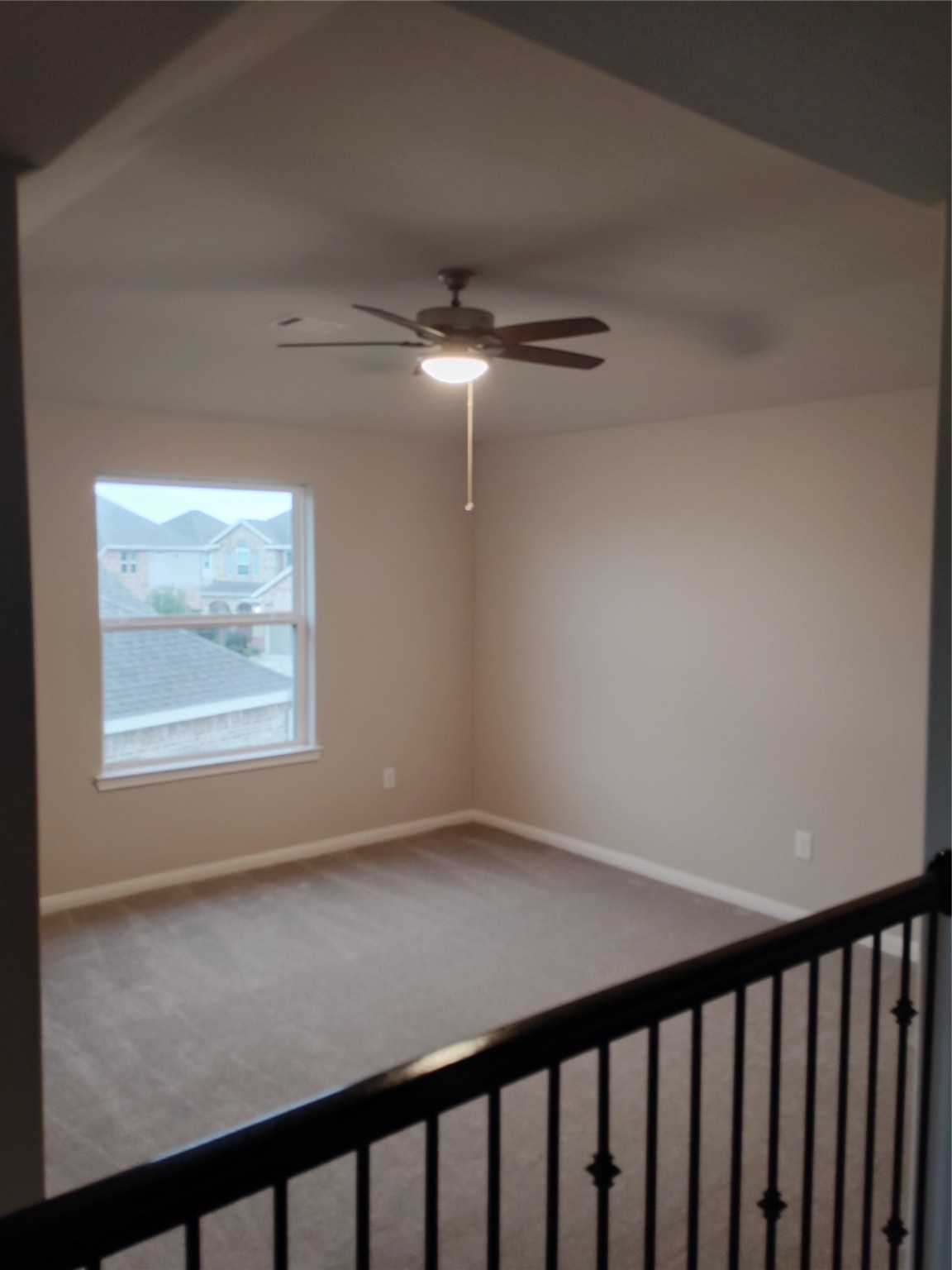 85 Carmel Drive Manvel, TX 77578 - Photo 6 of 31 a view of an empty room with a window