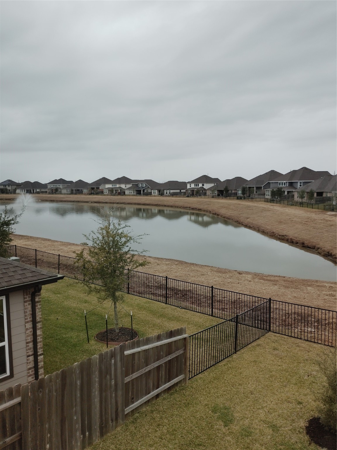 85 Carmel Drive Manvel, TX 77578 - Photo 8 of 31 a view of a terrace with lake view