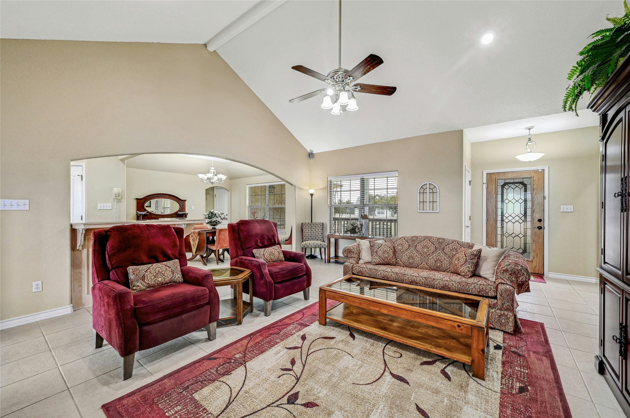 1370 Sunset View Fischer, TX 78623 - Photo 6 of 29 Living area with light tile patterned floors, high vaulted ceiling