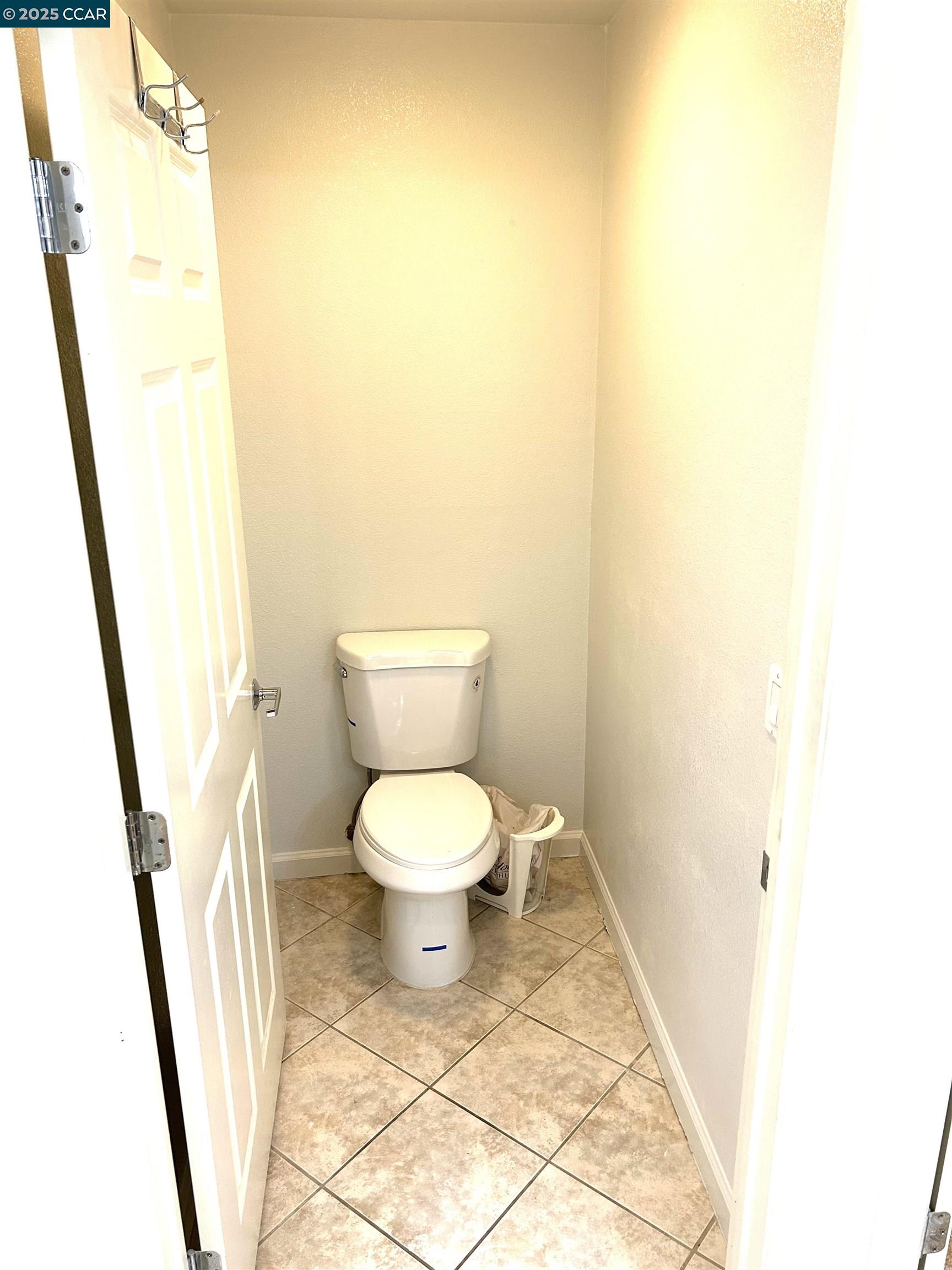 1310 Saddle Rack Street, Unit 352 San Jose, CA 95126 - Photo 13 of 41 a bathroom with a toilet and a sink