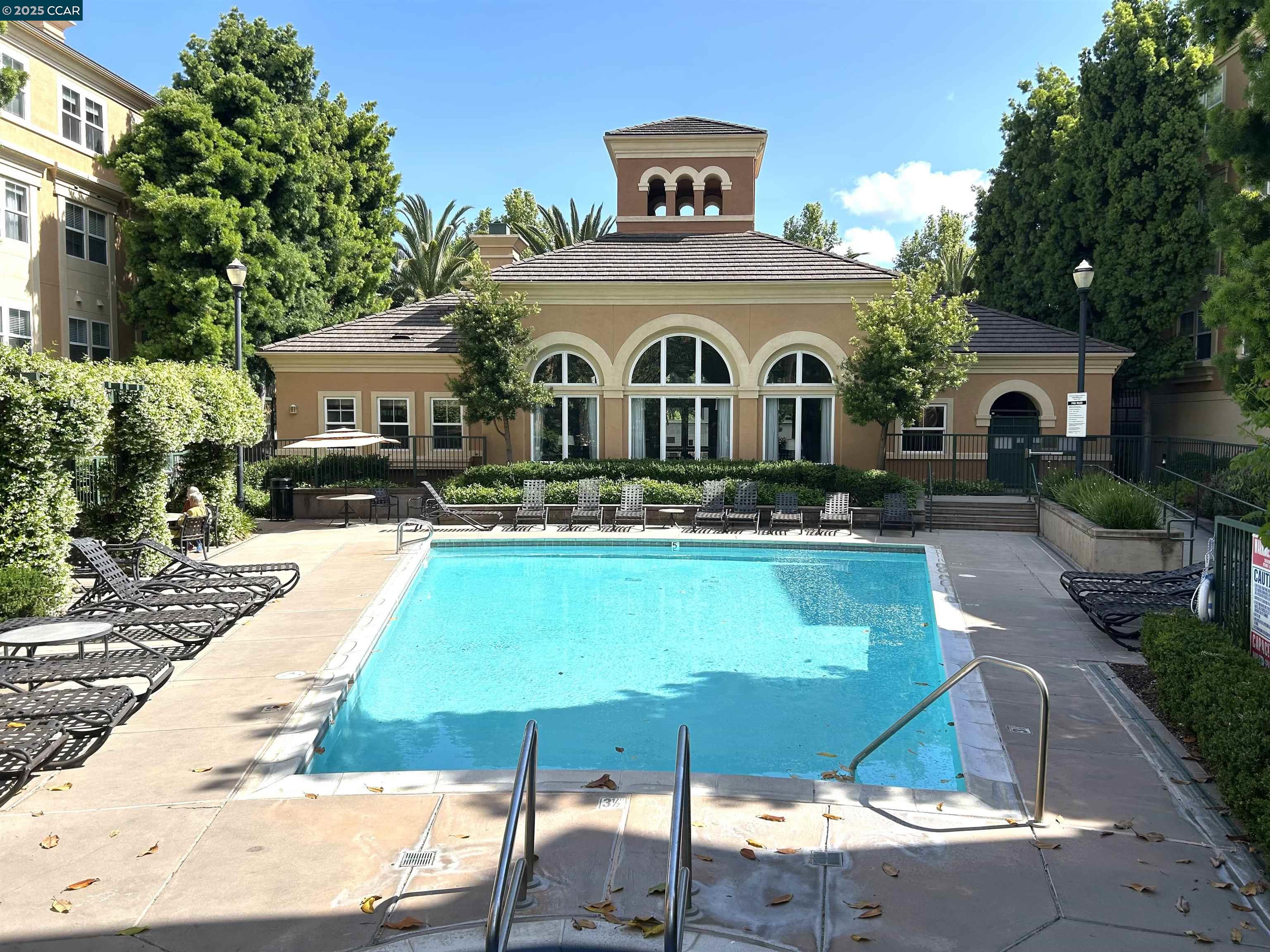 1310 Saddle Rack Street, Unit 352 San Jose, CA 95126 - Photo 23 of 41 a front view of a house with yard and green space