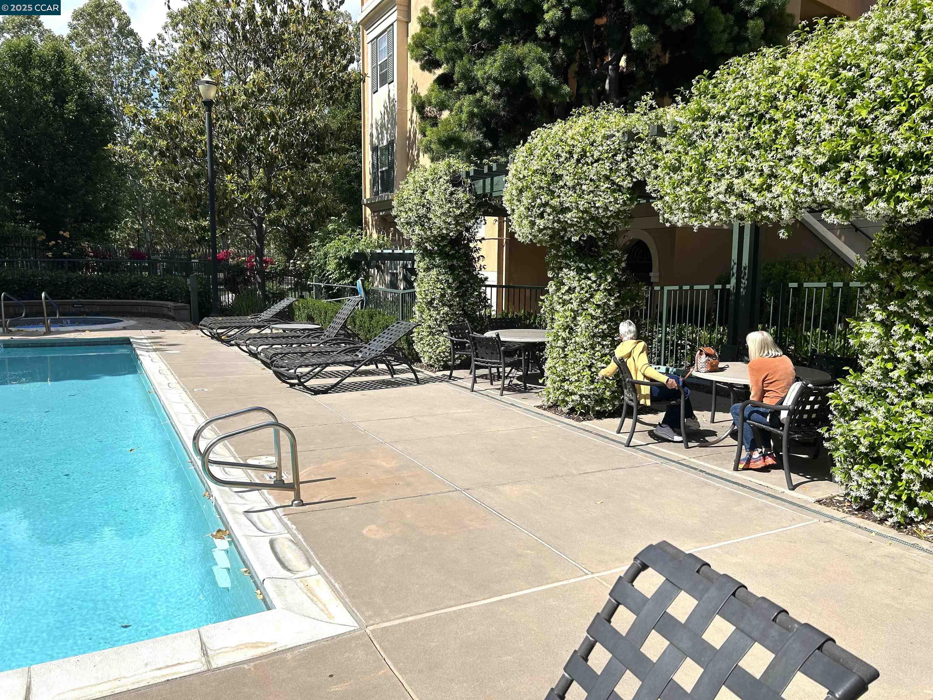 1310 Saddle Rack Street, Unit 352 San Jose, CA 95126 - Photo 25 of 41 a view of a backyard with sitting area