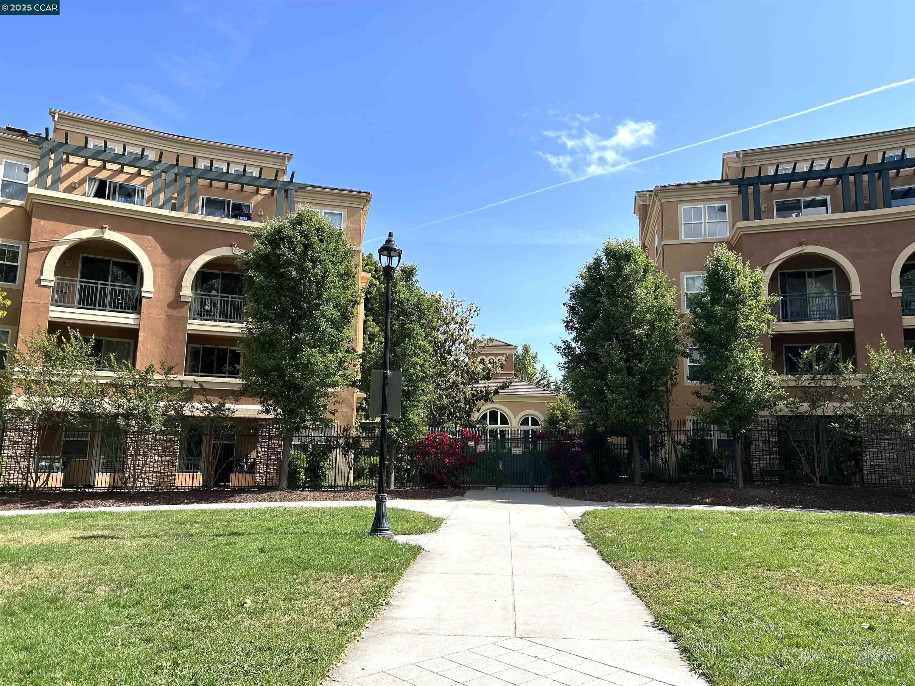 1310 Saddle Rack Street, Unit 352 San Jose, CA 95126 - Photo 28 of 41 a front view of a house with a garden