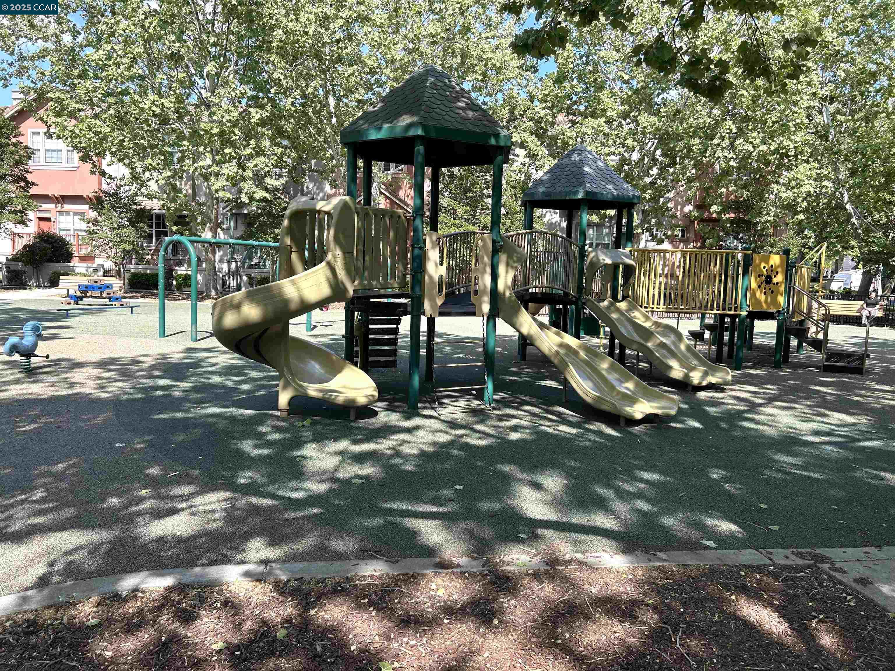 1310 Saddle Rack Street, Unit 352 San Jose, CA 95126 - Photo 31 of 41 a view of a park with swings and slides