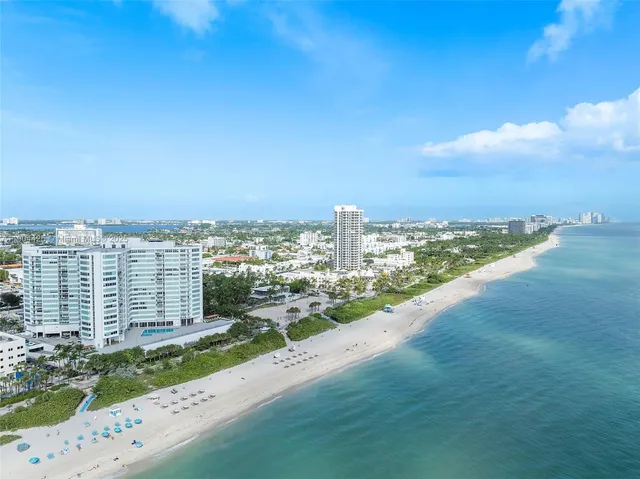 a view of a city with tall buildings in front of it