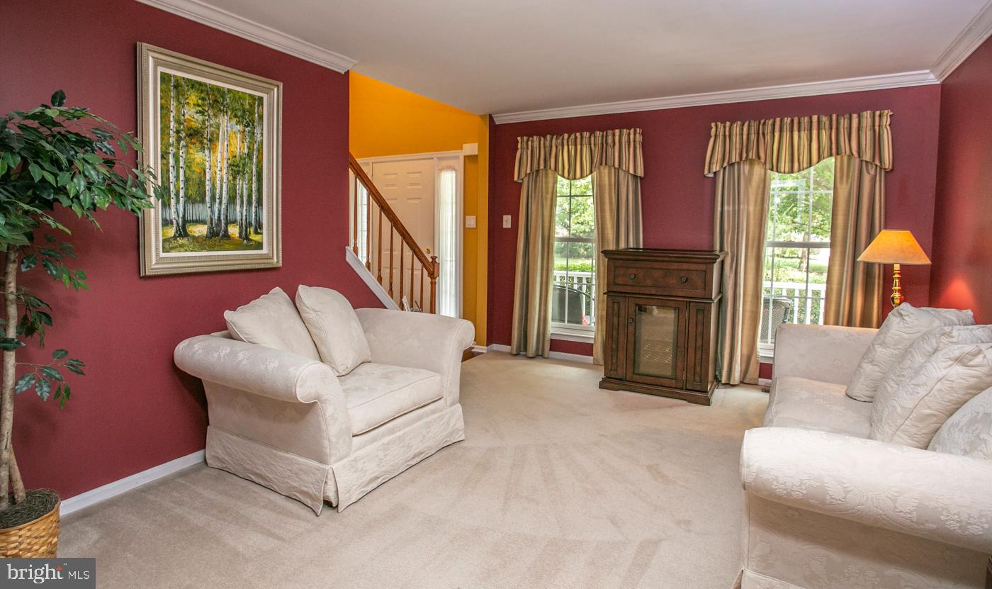 116 Summer Ridge Drive Lansdale, PA 19446 - Photo 12 of 52 a living room with furniture and a fireplace