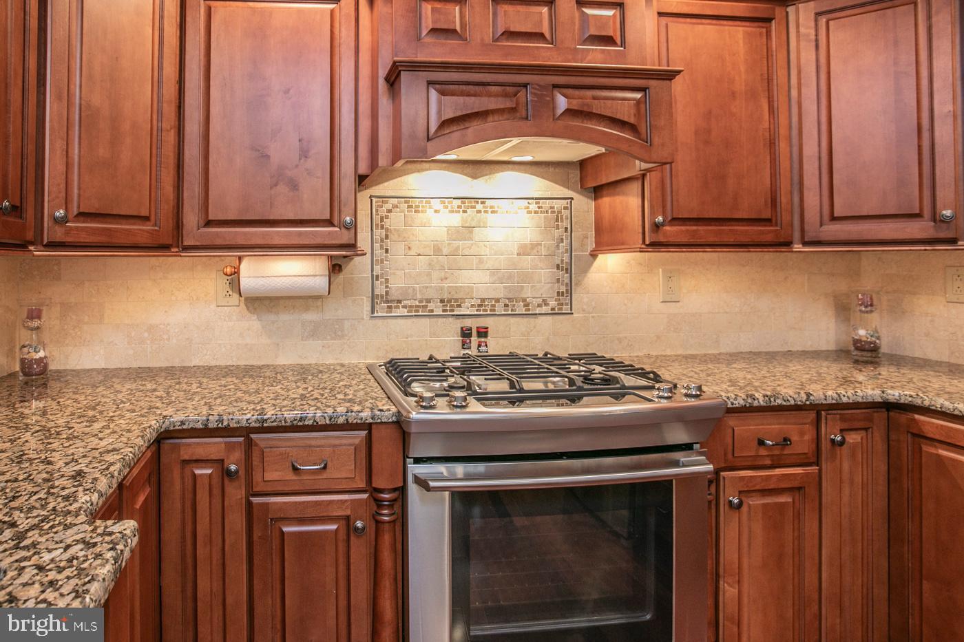 116 Summer Ridge Drive Lansdale, PA 19446 - Photo 19 of 52 a stove top oven sitting inside of a kitchen