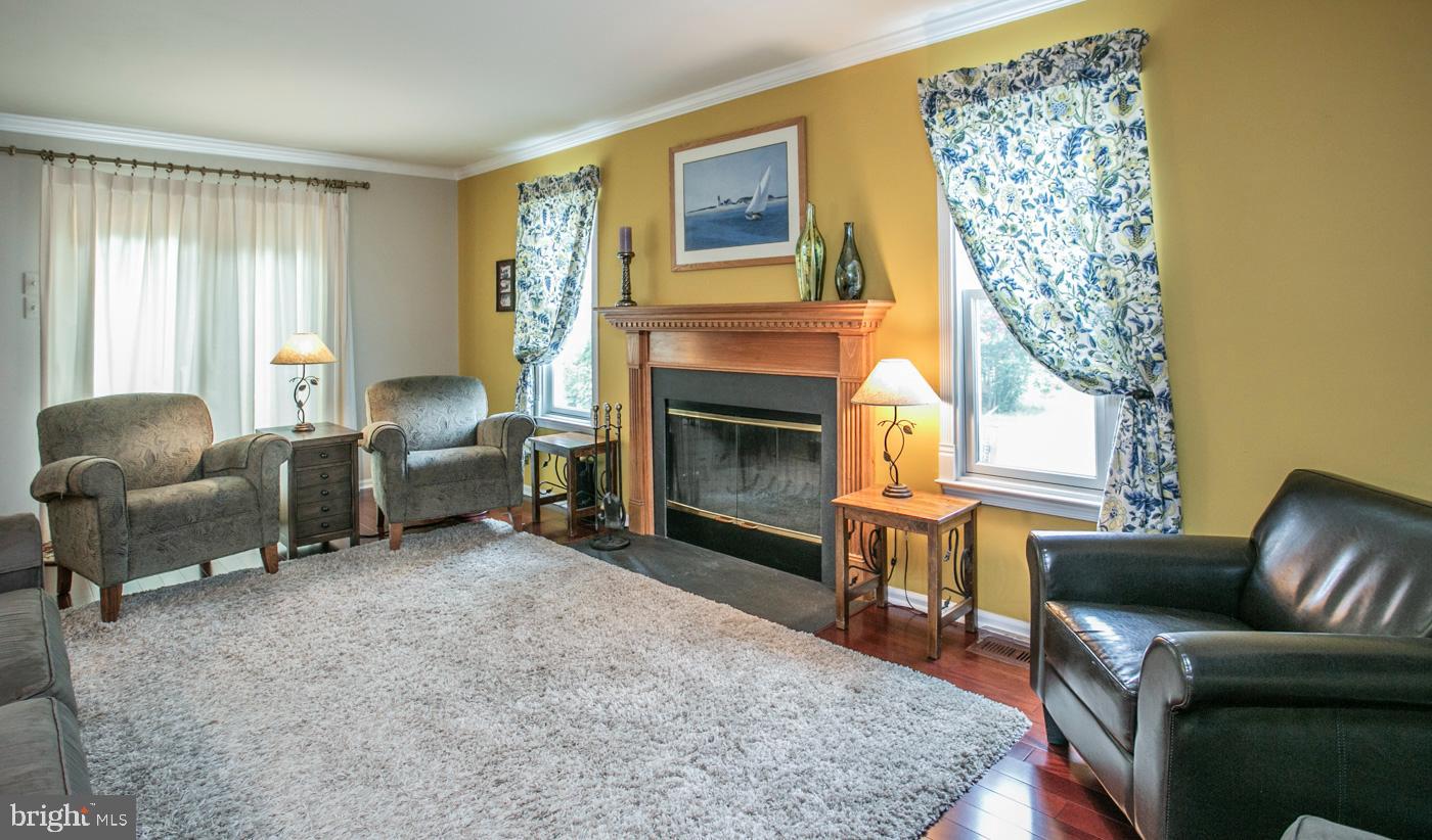 116 Summer Ridge Drive Lansdale, PA 19446 - Photo 25 of 52 a living room with furniture and a fireplace