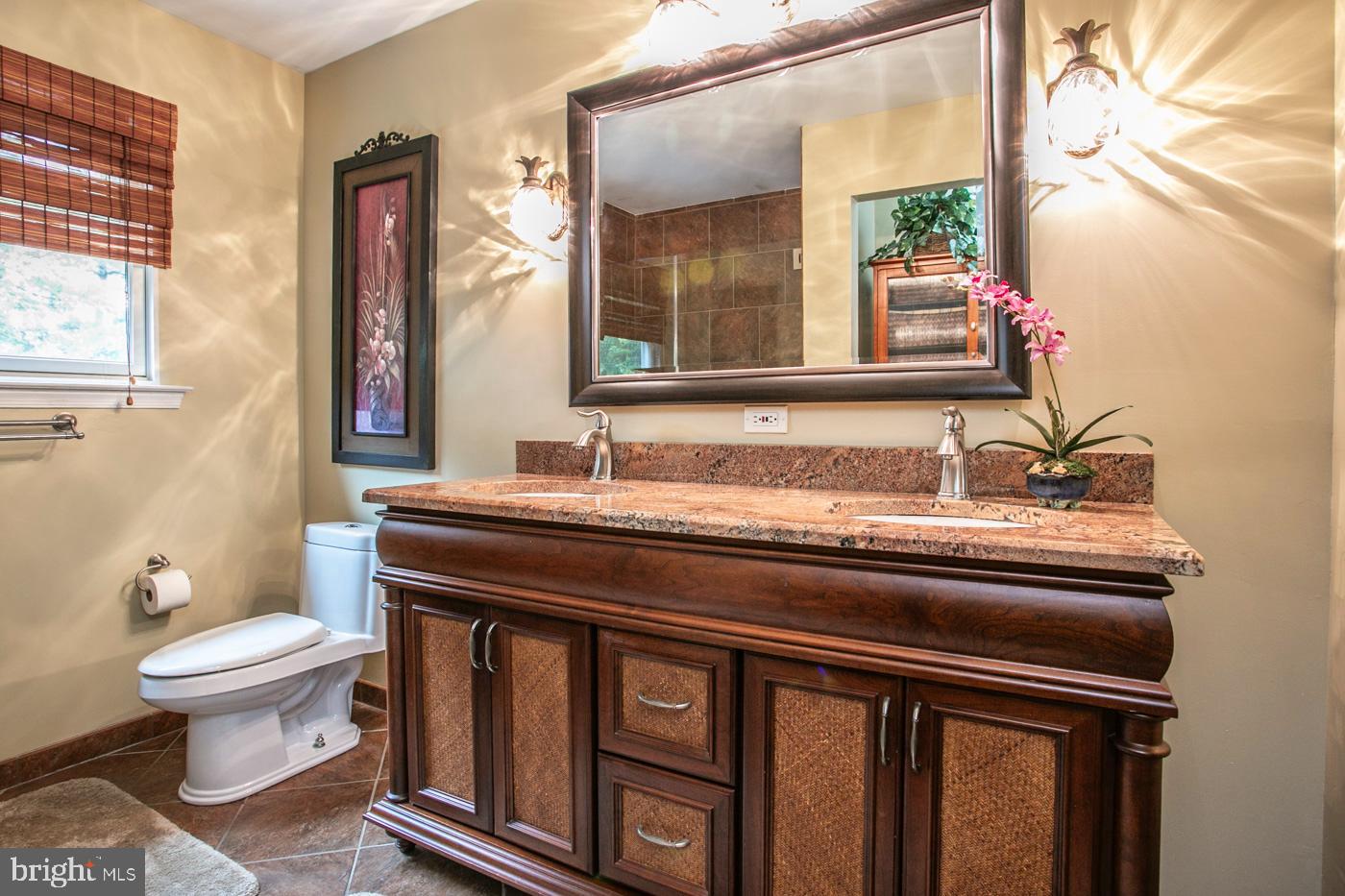 116 Summer Ridge Drive Lansdale, PA 19446 - Photo 32 of 52 a bathroom with a granite countertop toilet sink and mirror
