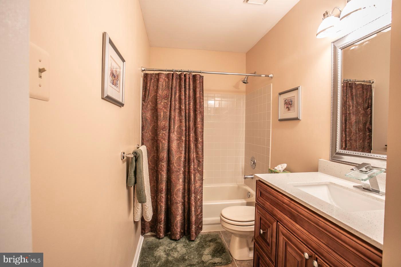 116 Summer Ridge Drive Lansdale, PA 19446 - Photo 37 of 52 a bathroom with a sink a toilet and shower