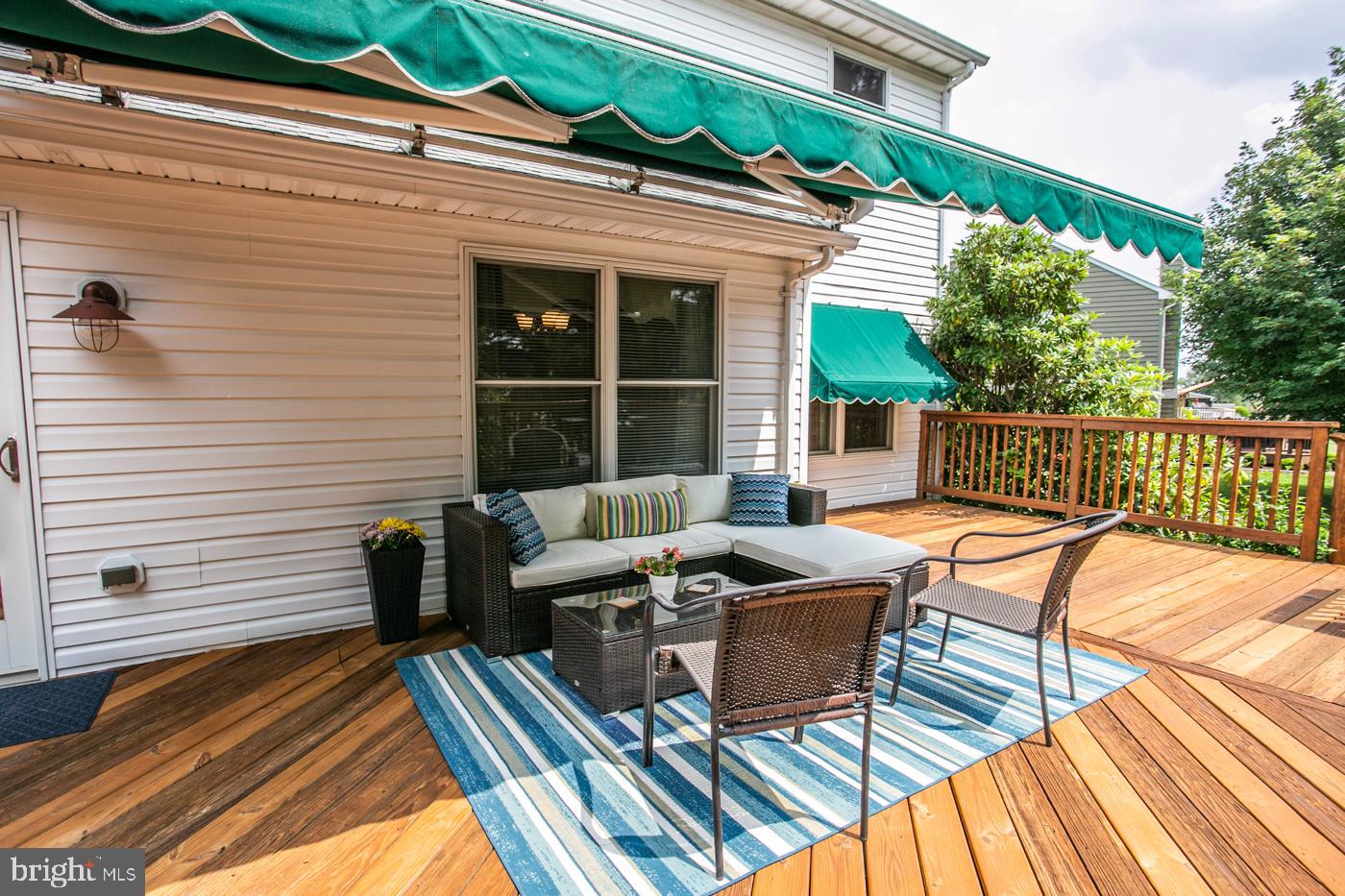 116 Summer Ridge Drive Lansdale, PA 19446 - Photo 45 of 52 a roof deck with table and chairs and potted plants