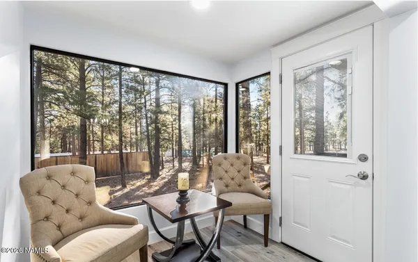 a kitchen with stainless steel appliances granite countertop wooden cabinets a stove top oven a sink and dishwasher