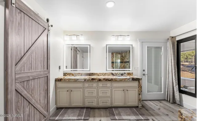 a kitchen with cabinets and a stove top oven