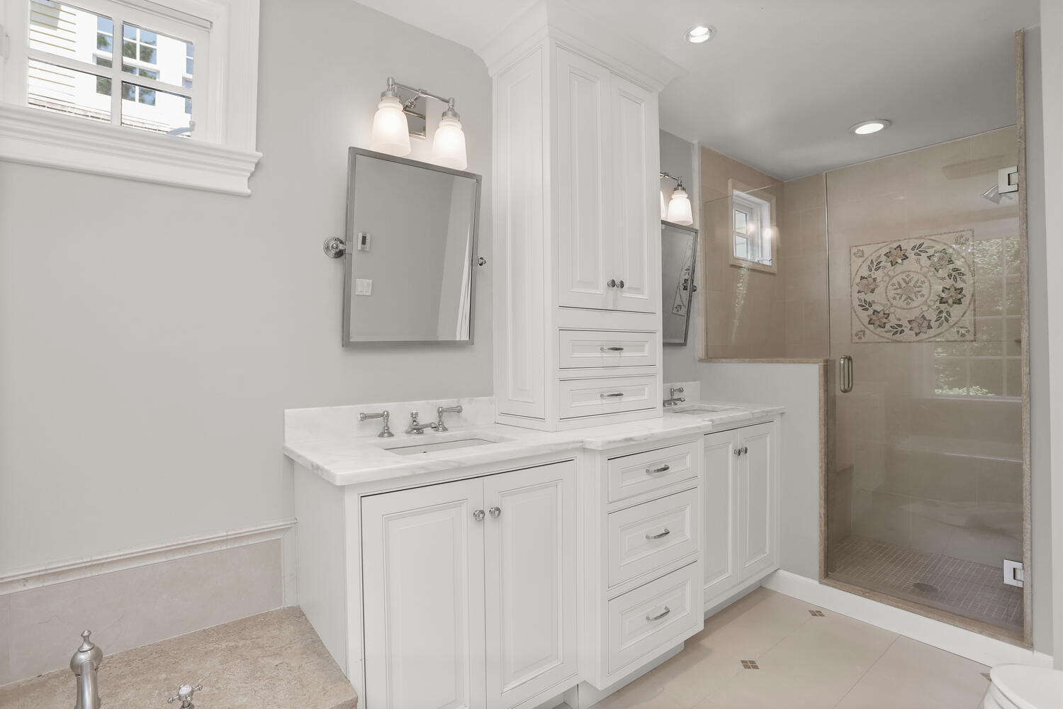 538 Laurel Road New Canaan, CT 06840 - Photo 11 of 28 a bathroom with double sink and a mirror
