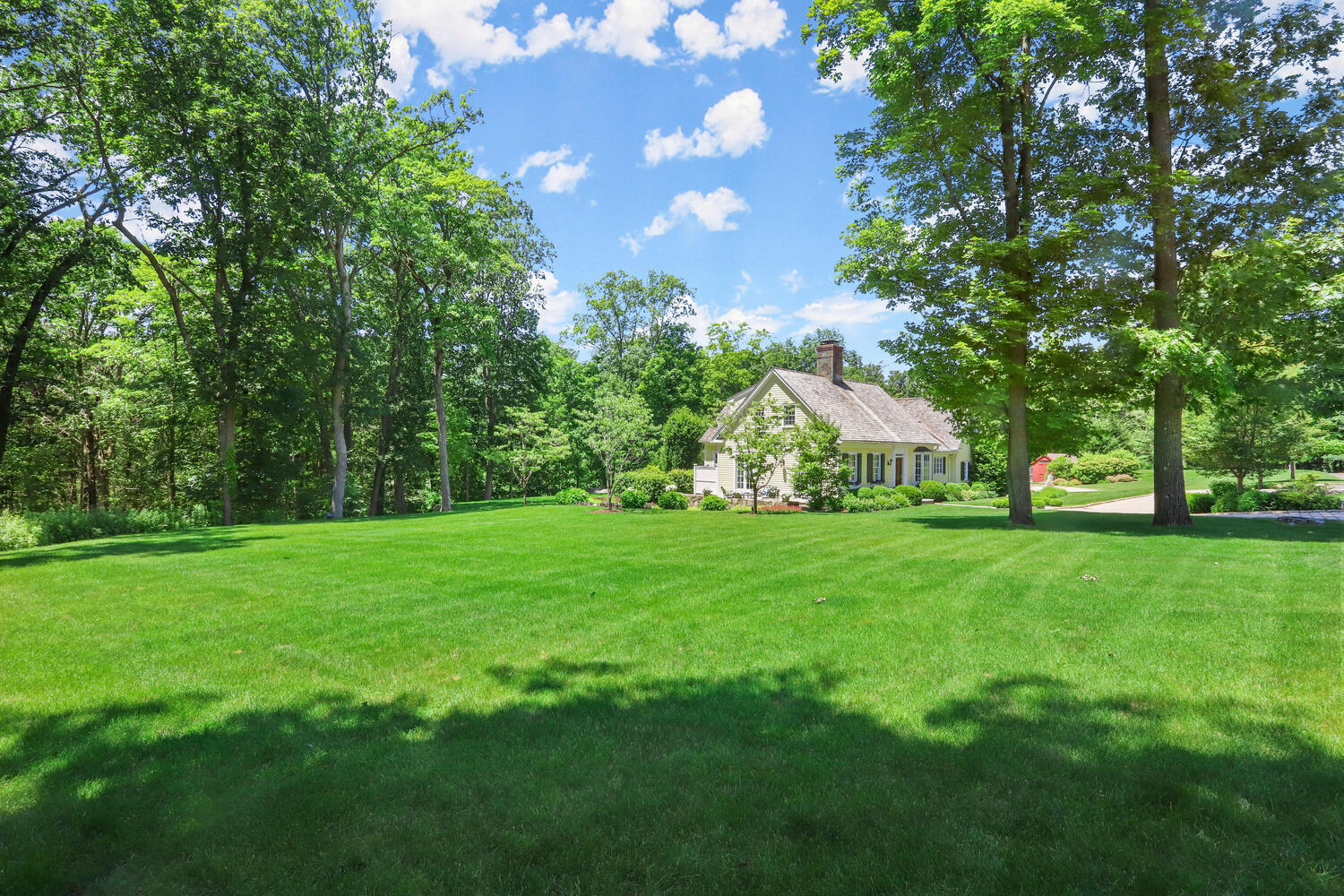 538 Laurel Road New Canaan, CT 06840 - Photo 19 of 28 a view of yard with swimming pool and green space