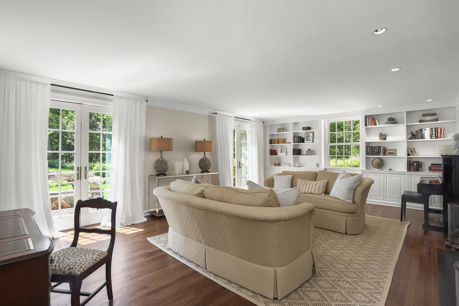 538 Laurel Road New Canaan, CT 06840 - Photo 2 of 28 a living room with furniture and a large window