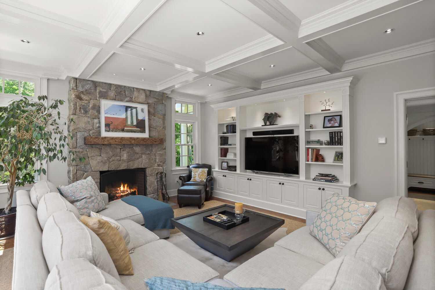 538 Laurel Road New Canaan, CT 06840 - Photo 6 of 28 a living room with furniture and a flat screen tv