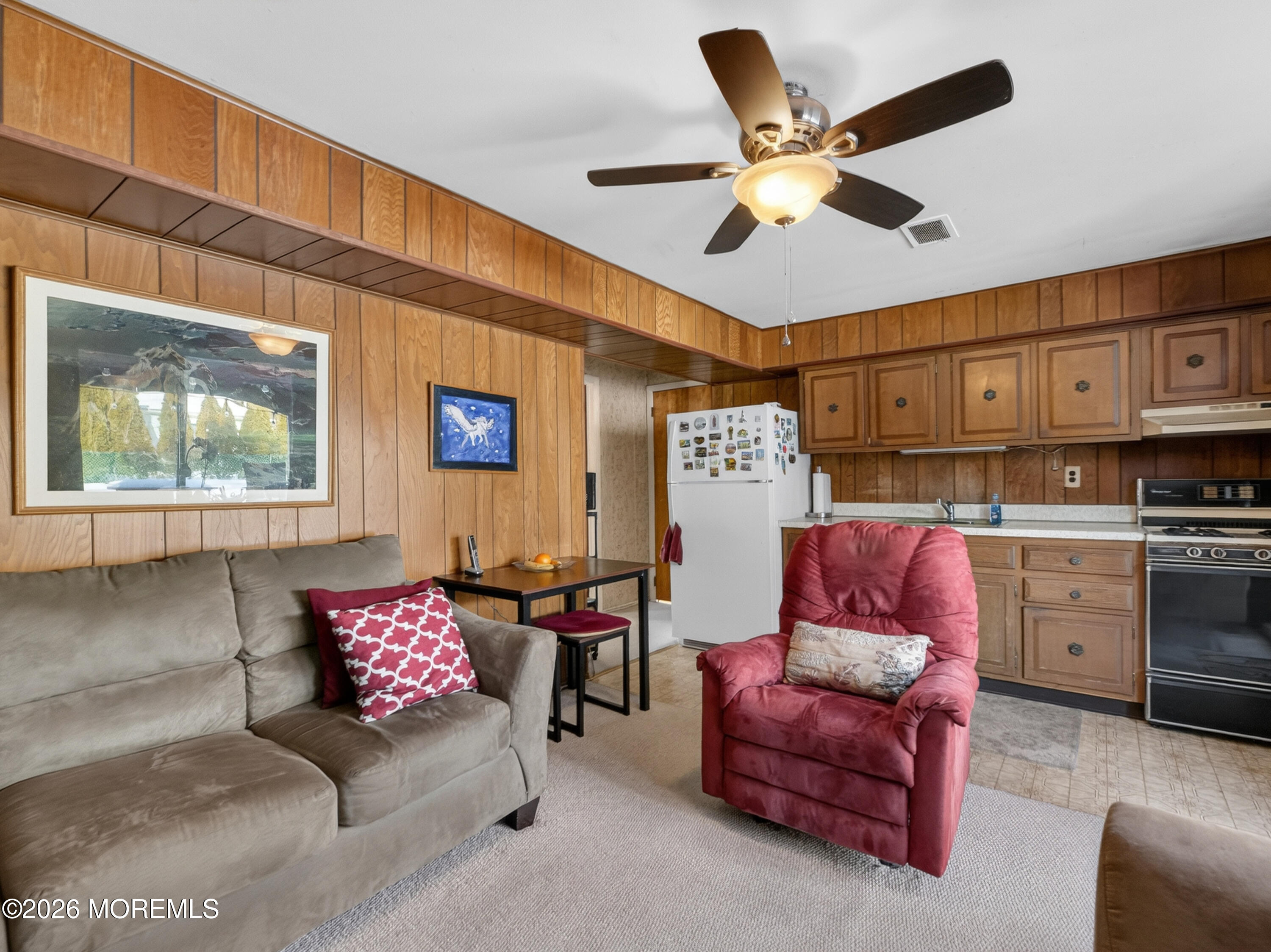 417 Crestview Terrace Brick, NJ 08723 - Photo 28 of 35 a living room with furniture and kitchen view