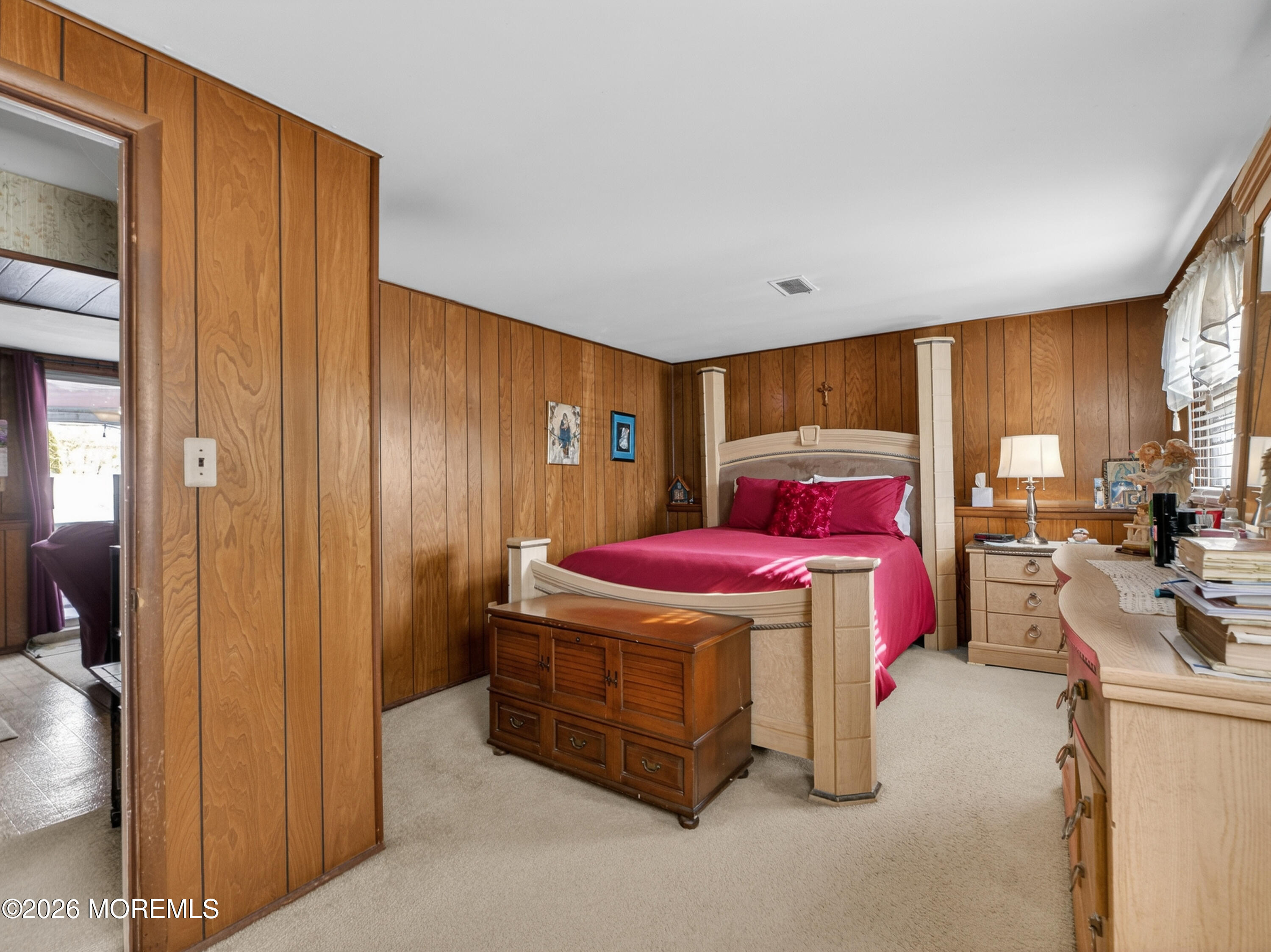 417 Crestview Terrace Brick, NJ 08723 - Photo 29 of 35 a bedroom with a bed and large windows