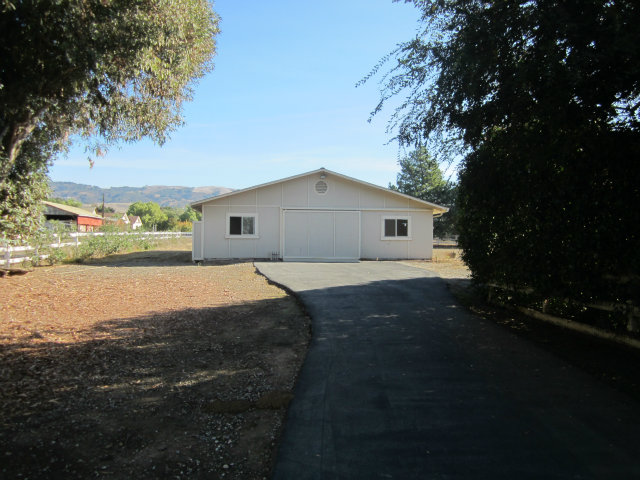 2460 Scarlet Road Gilroy, CA 95020 - Photo 3 of 15 a house view with a garden space
