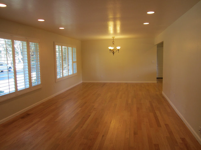 2460 Scarlet Road Gilroy, CA 95020 - Photo 8 of 15 an empty room with wooden floor and windows