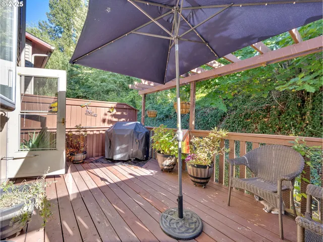 a view of a deck with furniture