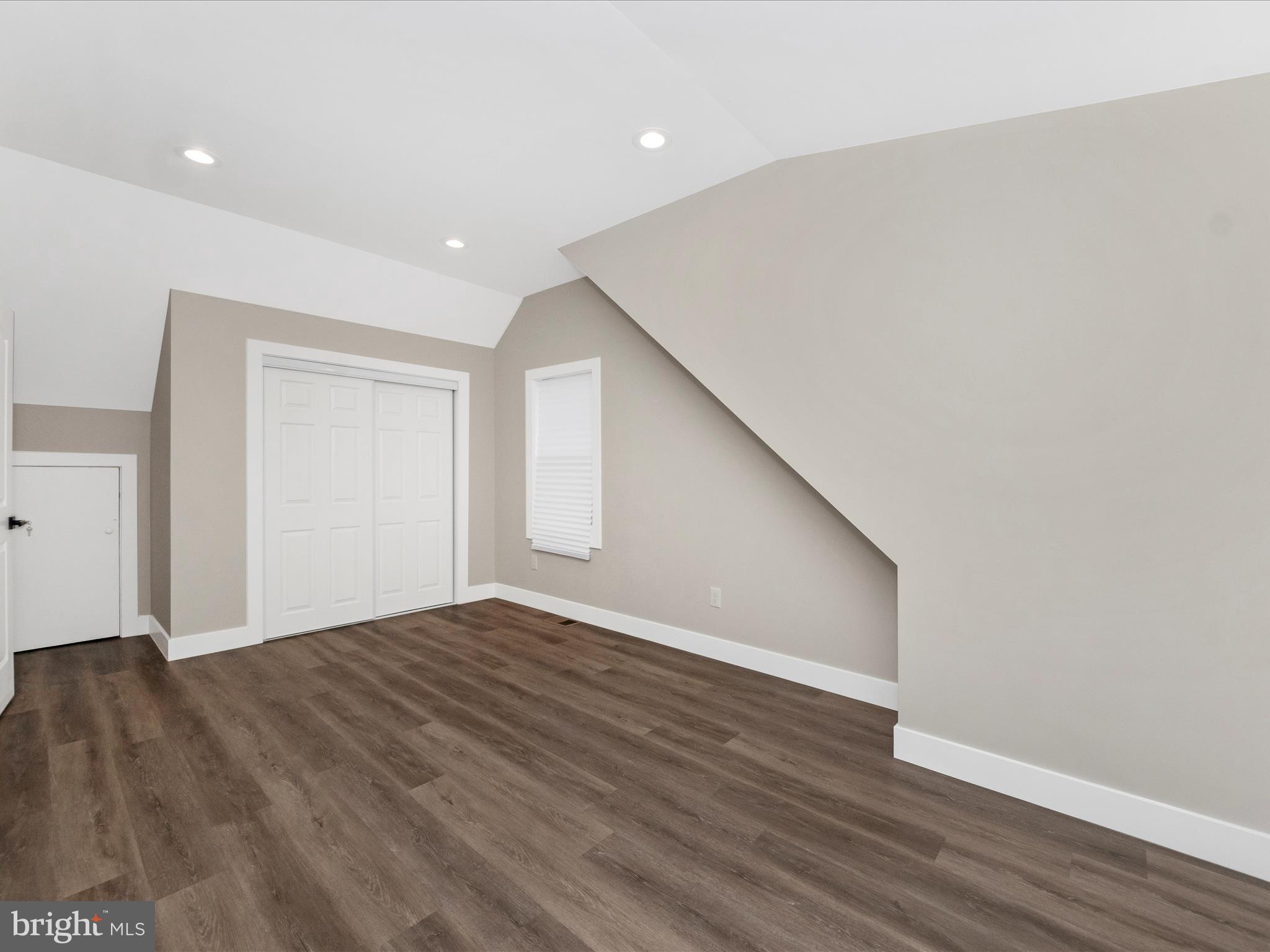 2812 Manoff Road Halethorpe, MD 21227 - Photo 22 of 55 a view of an empty room with wooden floor and closet