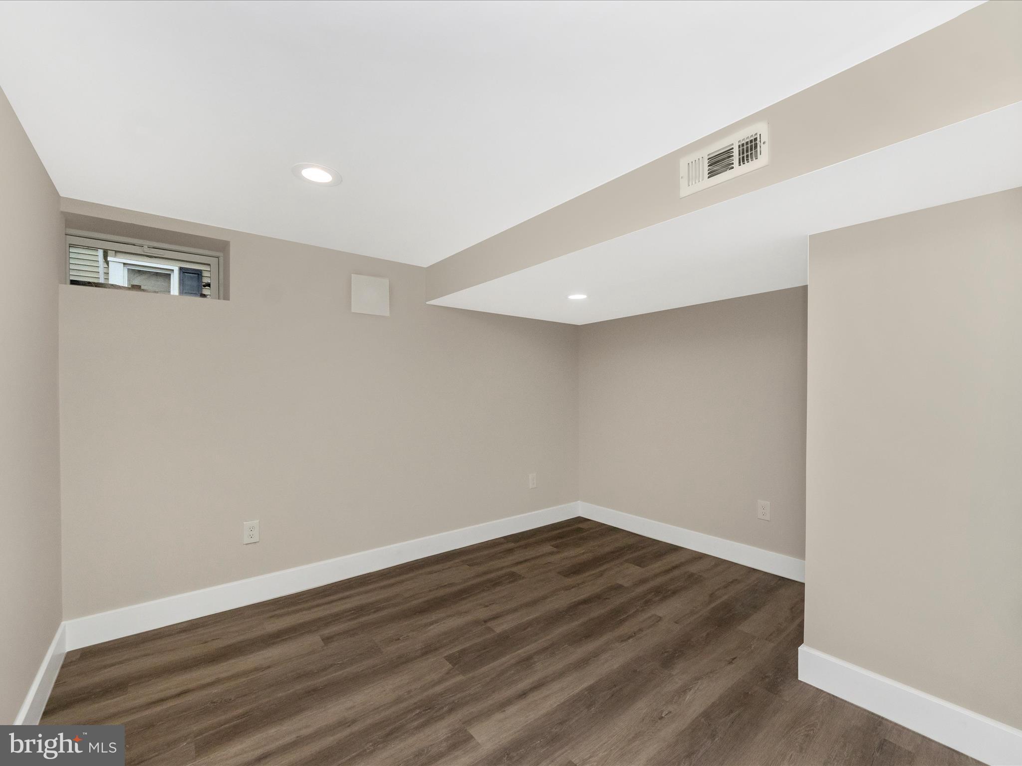 2812 Manoff Road Halethorpe, MD 21227 - Photo 31 of 55 a view of a room with wooden floor