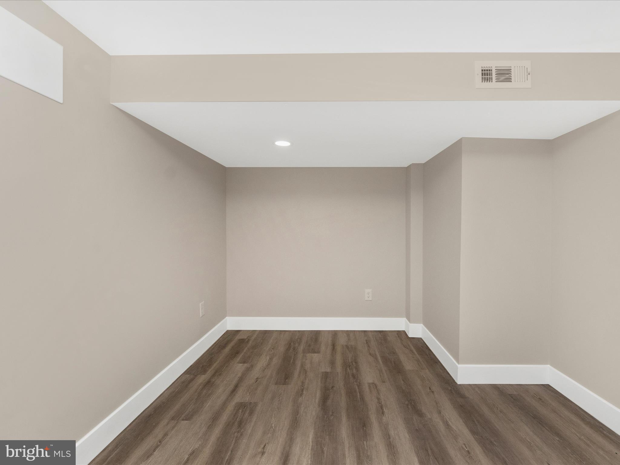 2812 Manoff Road Halethorpe, MD 21227 - Photo 33 of 55 a view of wooden floor in a room