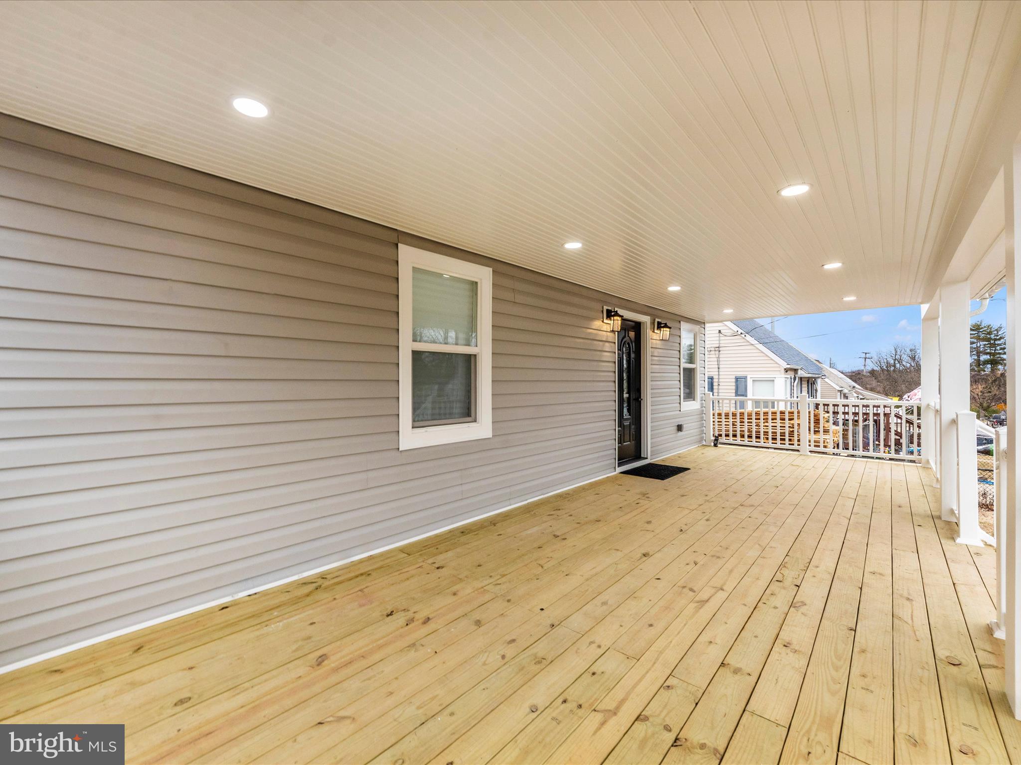 2812 Manoff Road Halethorpe, MD 21227 - Photo 48 of 55 a view of a hallway with wooden floor