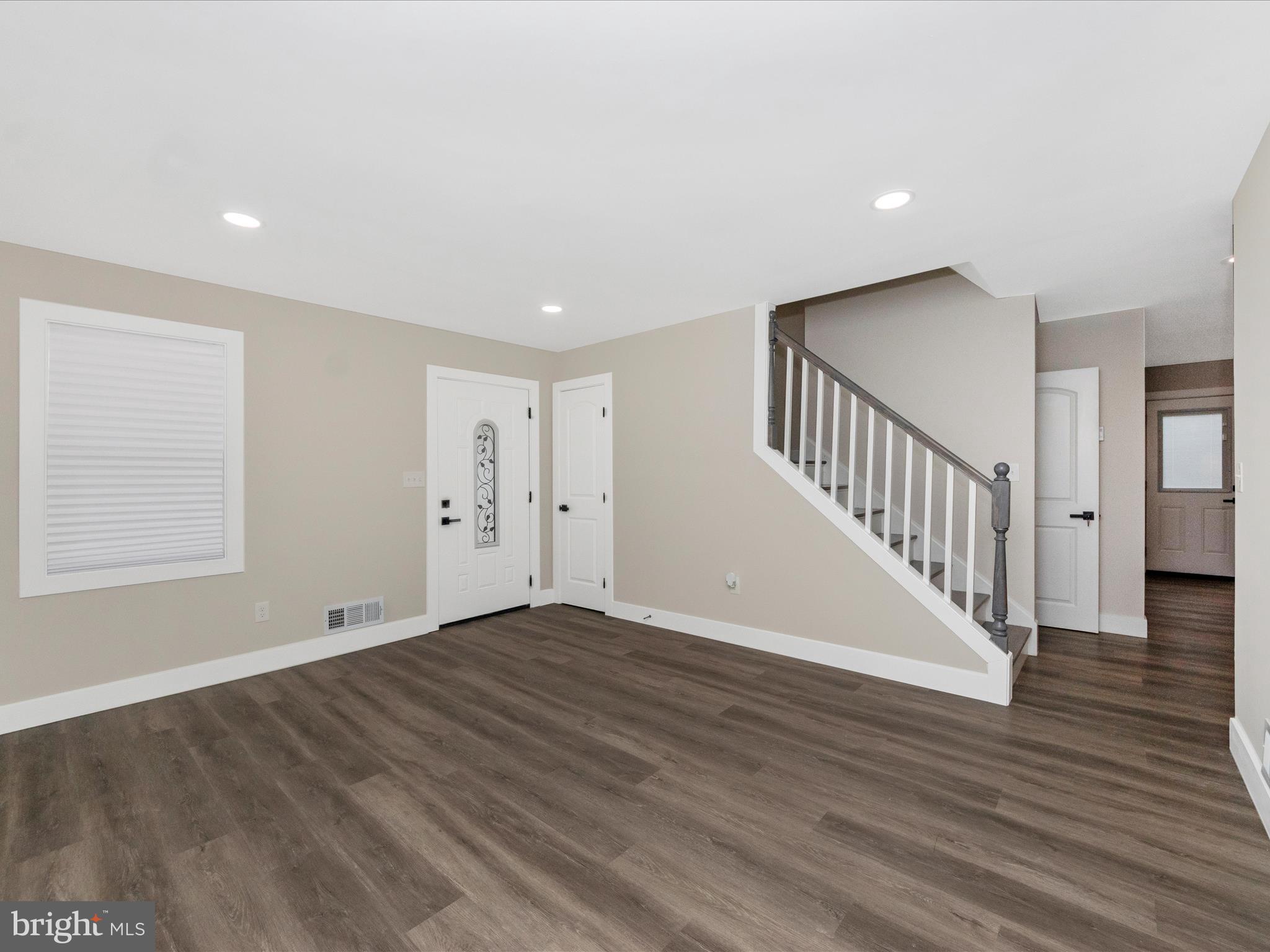 2812 Manoff Road Halethorpe, MD 21227 - Photo 5 of 55 a view of an entryway with wooden floor