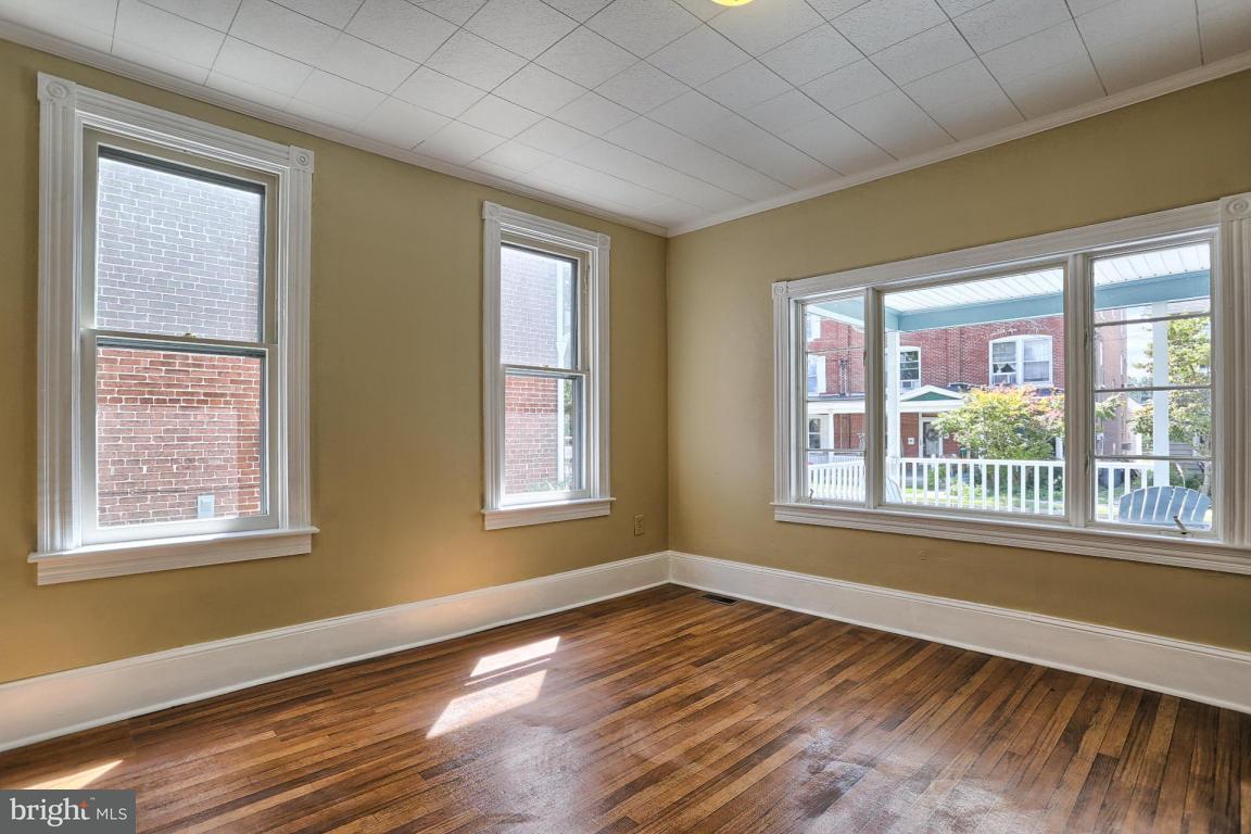 149 Front Street Lititz, PA 17543 - Photo 20 of 33 a view of an empty room with wooden floor and a window