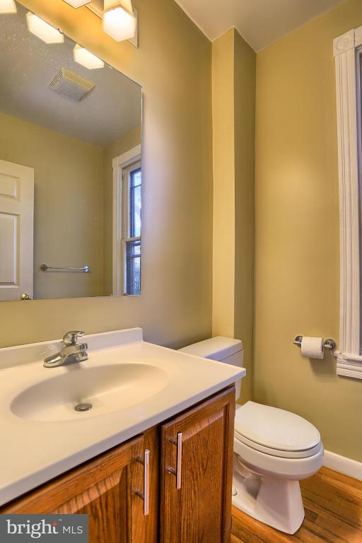 149 Front Street Lititz, PA 17543 - Photo 25 of 33 a bathroom with a sink a toilet and mirror