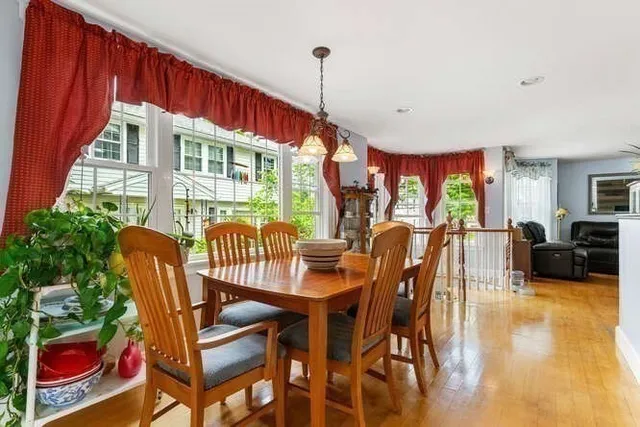 a view of a dining room with furniture window and outside view