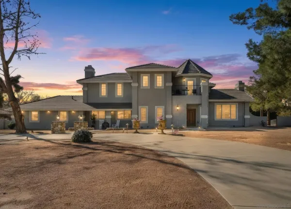 a front view of a building with a street