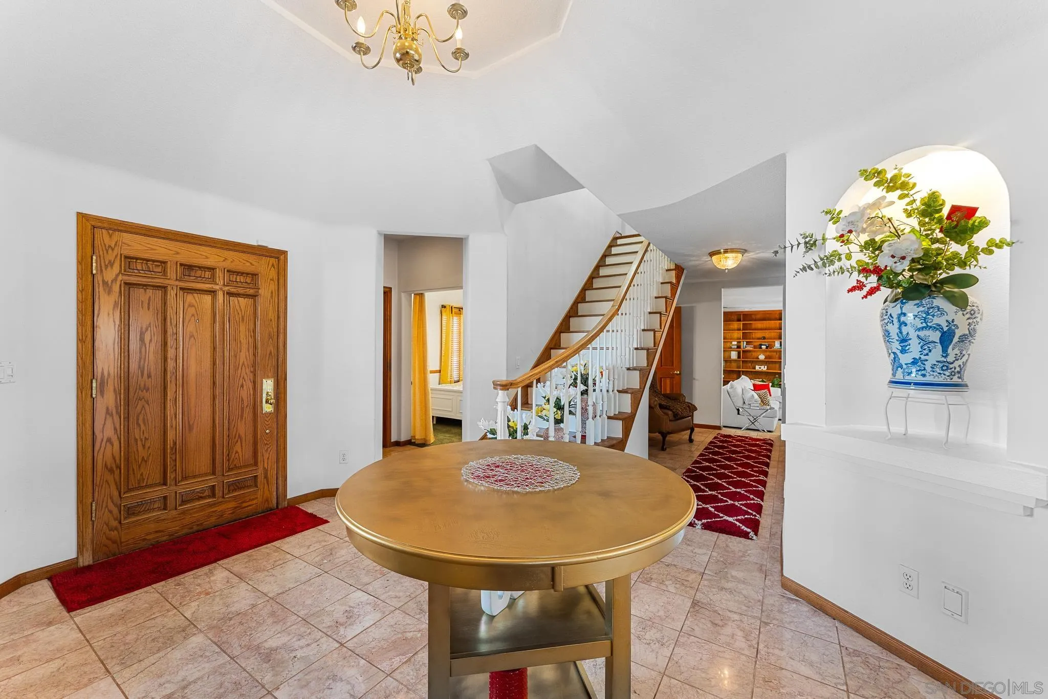 19775 Symeron Road Apple Valley, CA 92307 - Photo 32 of 73 a view of a dining room with furniture and a potted plant